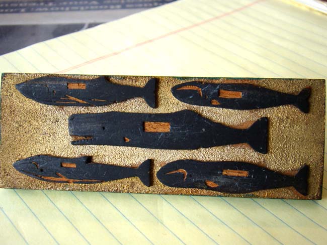 A charming miniature 19th century carved wooden sailing ship at drydock, the underside of base with five whaling log book stamps. — image 2